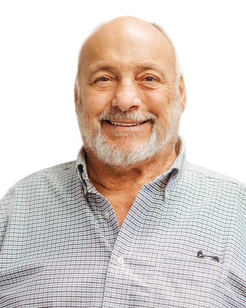 Image of a patient smiling after receiving all-on-x implant dentures.